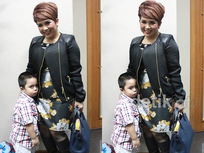 Senyuman Joy Tobing Bersama Joshua