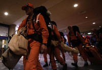 Tim SAR terus dikerahkan untuk mencari dan mengevakuasi para korban. REUTERS/Yuya Shino.
