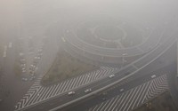 Asap tebal mengganggu lalu lintas di kota Harbin, Provinsi Heilongjiang. (AFP).