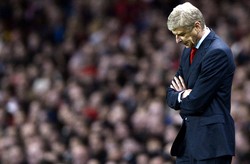 Arsene Wenger tampak kecewa. Dengan hasil tersebut, Arsenal masih memimpin klasemen sementara Grup F dengan enam poin dari tiga partai. Dortmund di posisi kedua dengan jumlah poin sama. Reuters/Dylan Martinez