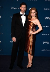 Tak hanya sendiri, Amy Adams juga mengajak tunangannya Darren Le Gallo. Frazer Harrison/Getty Images/AFP.