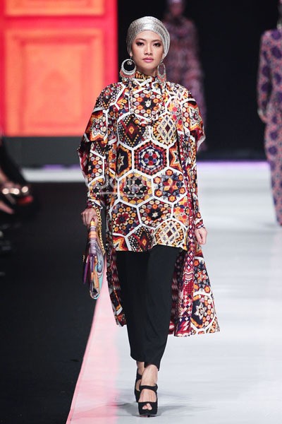 Jakarta, Indonesia - 20 Oktober. Itang Yunasz Indonesia Now. Jakarta Fashion Week 2014 at Senayan City. 20 Oktober 2013. Jakarta. [Foto: Mohammad Abduh/Wolipop]