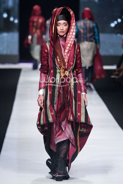 Jakarta, Indonesia - 20 Oktober. Deden Siswanto Royal Fair. Jakarta Fashion Week 2014 at Senayan City. Jakarta. [Foto: Mohammad Abduh/Wolipop]