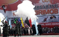 Acara ini mengusung tema 'Dengan Semangat Soliditas dan Profesionalisme, Korps Brimob Siap Mengamankan Pemilu 2014'.