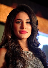 Bintang film Bollywood 'Rockstar' itu tampak cantik dengan rambut bergelombangnya yang dibiarkan tergerai. AFP PHOTO/STR.