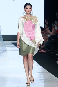 Jakarta, Indonesia - 22 Oktober. Agnes Budhisurya Peony. Jakarta Fashion Week 2014 at Senayan City. Jakarta. [Foto: Mohammad Abduh/Wolipop]