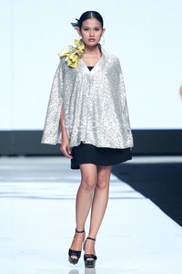 Jakarta, Indonesia - 22 Oktober. Agnes Budhisurya Peony. Jakarta Fashion Week 2014 at Senayan City. Jakarta. [Foto: Mohammad Abduh/Wolipop]