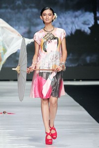 Jakarta, Indonesia - 22 Oktober. Fuji Tjandra Asia Syndrome. Jakarta Fashion Week 2014 at Senayan City. 22 Oktober 2013. Jakarta. [Foto: Mohammad Abduh/Wolipop]