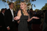 Tiba di lokasi acara, Kirsten Dunst langsung menjadi sorotan. Mark Metcalfe/Getty Images.