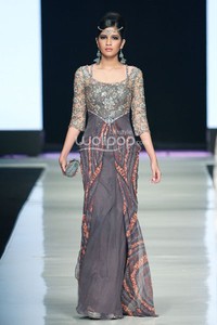 Jakarta, Indonesia - 23 Oktober. Qonita Gholib by Qonita Boutique. Masterpiece Batik Ethnic. Jakarta Fashion Week 2014 at Senayan City. 23 Oktober 2013. Jakarta. [Foto: Mohammad Abduh/Wolipop]