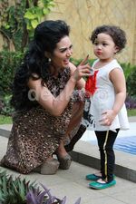 Krisdayanti dan si Imut Amora