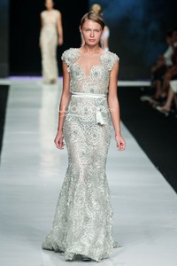 Jakarta, Indonesia - 24 Oktober. Hian Tjen La Romantic De La Femme. FASHION COUNCIL presents LPM GRADUATES. Jakarta Fashion Week 2014 at Senayan City. 24 Oktober 2013. Jakarta. [Foto: Mohammad Abduh/Wolipop]