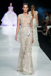 Jakarta, Indonesia - 24 Oktober. Hian Tjen La Romantic De La Femme. FASHION COUNCIL presents LPM GRADUATES. Jakarta Fashion Week 2014 at Senayan City. 24 Oktober 2013. Jakarta. [Foto: Mohammad Abduh/Wolipop]