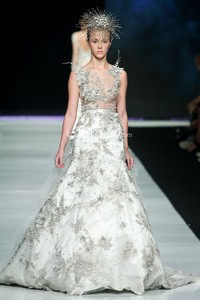 Jakarta, Indonesia - 24 Oktober. Hian Tjen La Romantic De La Femme. FASHION COUNCIL presents LPM GRADUATES. Jakarta Fashion Week 2014 at Senayan City. 24 Oktober 2013. Jakarta. [Foto: Mohammad Abduh/Wolipop]