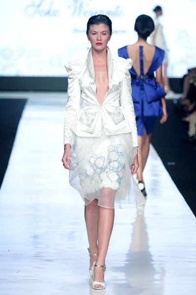 Jakarta, Indonesia - 23 Oktober. Soko Wiyanto Fiore. MAZDA YOUNG VIBRANT DESIGNERS Kodo soul of motion. Jakarta Fashion Week 2014 at Senayan City. 23 Oktober 2013. Jakarta. [Foto: Mohammad Abduh/Wolipop]