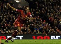 Raheem Sterling merayakan gol yang dibuatnya di menit ke-88. Reuters/Phil Noble.