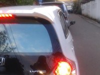 Perhatikan kaca spion sebelah kanan. (Foto:Pool)