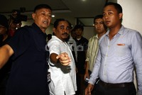 Luthfi datang ke Pengadilan Tipikor dengan dikawal petugas KPK. Lamhot Aritonang/detikFoto.