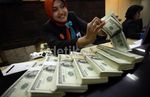 Nilai Tukar Rupiah Terus Tertekan