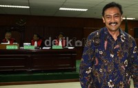Andi meninggalkan ruang sidang seusai memberikan kesaksian. Lamhot Aritonang/detikFoto.