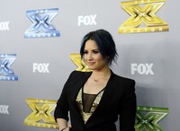 Pelantun 'Heart Attack' Demi Lovato, berhasil membawa pulang penghargaan dengan kategori Favorite Female Artist. REUTERS/Kevork Djansezian.