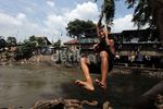 Bermain di Sungai Ciliwung