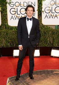 Orlando Bloom terlihat tampan lewat setelan tuxedo. Jason Merritt/Getty Images/AFP.     
