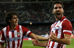 Raul Garcia merayakan gol yang dibuatnya di menit ke-89. Reuters/Juan Medina.