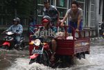 Jalan Yos Sudarso Terendam Banjir