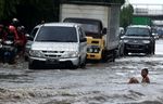 Jalan Yos Sudarso Terendam Banjir
