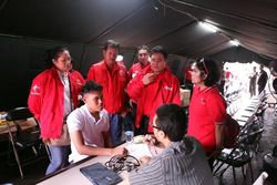 Telepon & Internet Gratis di Posko Banjir Telkomsel