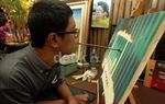 Pelukis Dengen Mulut di SIKIB Expo
