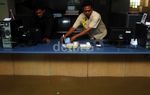 Banjir Masuki Perkantoran di Jalan Angkasa