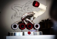 Jadi bila sebelumnya perangkat ini menghasilkan deruan mesin, kini perangkat ini menghasilkan alunan nada dari iPod atau iPhone. (dok iXoost).