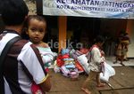 Korban Banjir Tinggalkan Pengungsian