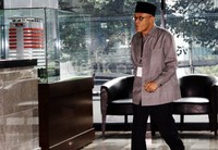 Tri tiba di gedung KPK, Jl Rasuna Said, Jakarta sekitar pukul 10.10 WIB. Lamhot Aritonang/detikFoto.