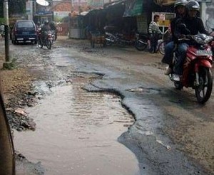Proyek Besar, Rp 2 T Digelontorkan untuk Perbaikan Jalan Rusak Pasca Banjir