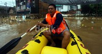 Banjir ini disebabkan luapan sungai Ciliwung.