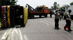 Bus Terguling di Jalur Pantura Pasuruan