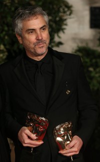 Lewat film 'Gravity' sutradara asal Meksiko Alfonso Cuarón berhasil meraih penghargaan Best Director. Chris Jackson/Getty Images.