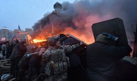 Kiev telah dilanda aksi demo anti pemerintah sejak Presiden Viktor Yanukovych tunduk pada tekanan Rusia dan menarik diri dari perjanjian perdagangan yang direncanakan dengan Uni Eropa semakin parah. AFP Photo/Sergei Supinsky.
