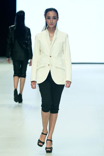 Steven Tach Natural. BNI Iniverse Bonding. Indonesia Fashion Week 2014 at Jakarta Convention Center. Senayan. Jakarta. [Foto: Mohammad Abduh/Wolipop]