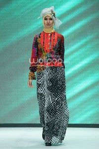 Tuneeca Dominatric. Fashion Parade Purity Transcendence. Indonesia Fashion Week 2014 at Jakarta Convention Center. Senayan. Jakarta. [Foto: Mohammad Abduh/Wolipop]