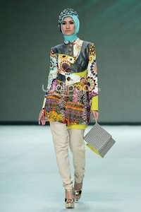 Tuneeca Dominatric. Fashion Parade Purity Transcendence. Indonesia Fashion Week 2014 at Jakarta Convention Center. Senayan. Jakarta. [Foto: Mohammad Abduh/Wolipop]