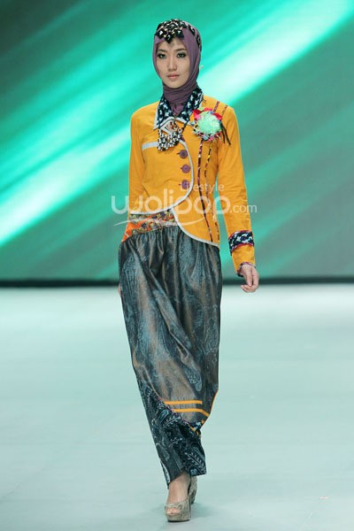 Tuneeca Dominatric. Fashion Parade Purity Transcendence. Indonesia Fashion Week 2014 at Jakarta Convention Center. Senayan. Jakarta. [Foto: Mohammad Abduh/Wolipop]