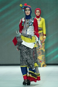 Tuneeca Dominatric. Fashion Parade Purity Transcendence. Indonesia Fashion Week 2014 at Jakarta Convention Center. Senayan. Jakarta. [Foto: Mohammad Abduh/Wolipop]