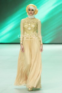 Risty Tagor Gorgeous Gold. Fashion Parade Purity Transcendence. Indonesia Fashion Week 2014 at Jakarta Convention Center. Senayan. Jakarta. [Foto: Mohammad Abduh/Wolipop]