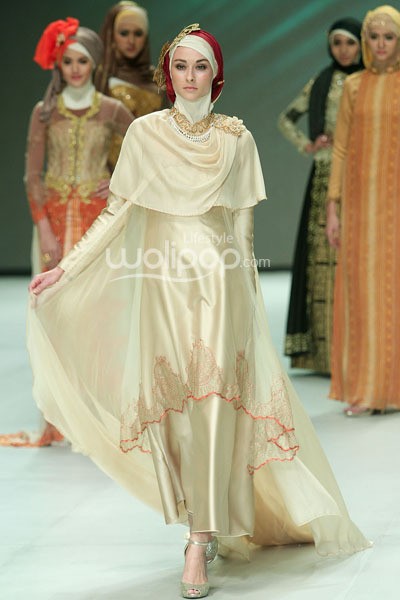 Risty Tagor Gorgeous Gold. Fashion Parade Purity Transcendence. Indonesia Fashion Week 2014 at Jakarta Convention Center. Senayan. Jakarta. [Foto: Mohammad Abduh/Wolipop]