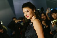 Mantan istri dari aktor Orlando Bloom ini nampak berseri-seri saat berpose di depan kamera. Vittorio Zunino Celotto/Getty Images.