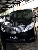 KPK Sita Dua Mobil Mewah